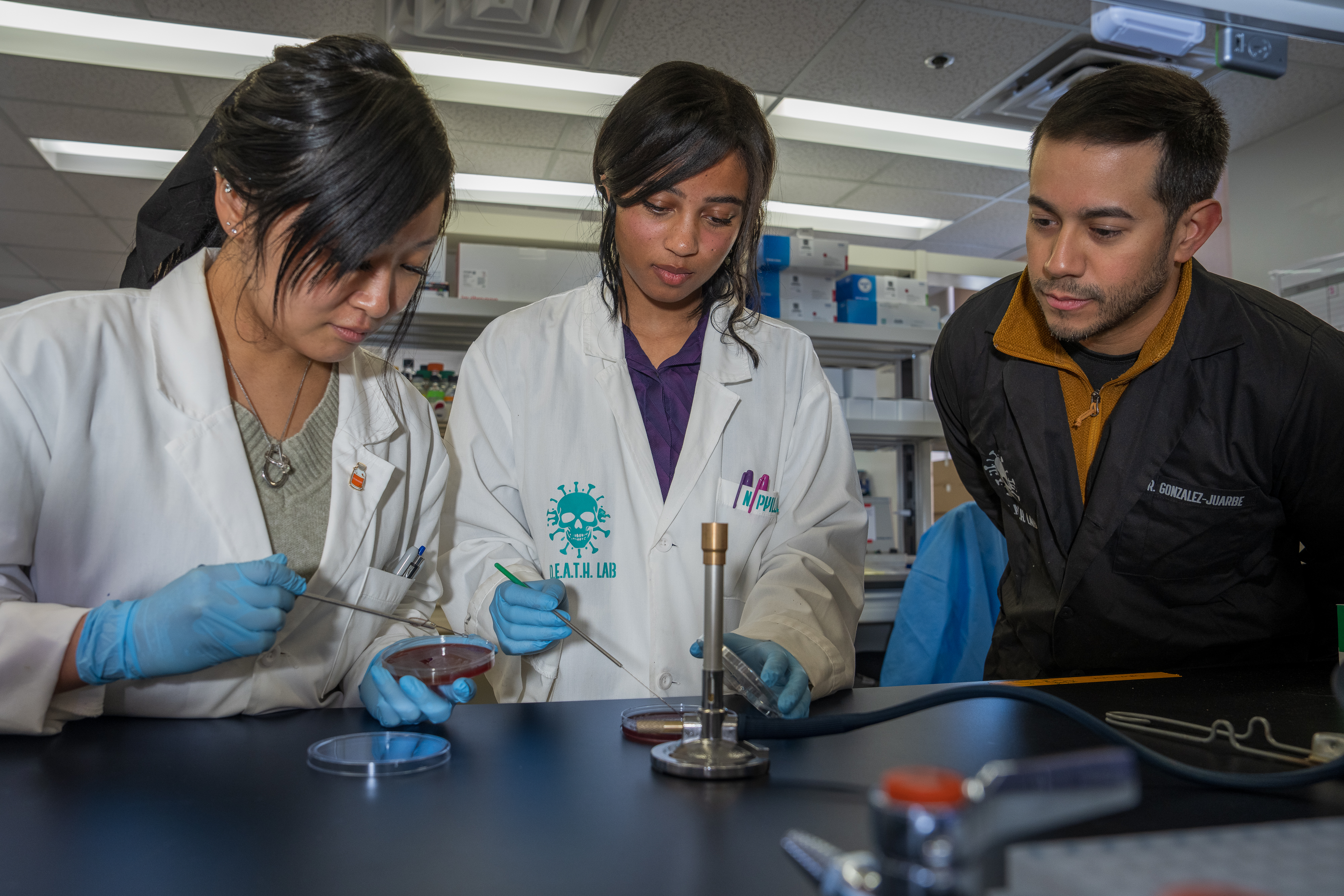 Ph.D. Students and Norberto González-Juarbe in the lab